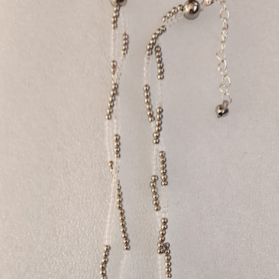 Entwined short Clear and Silver beaded Necklace