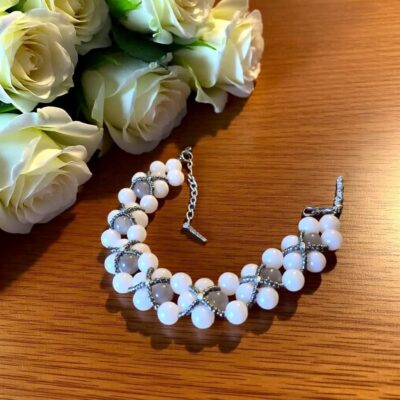 White & Grey with a cross weave bracelet